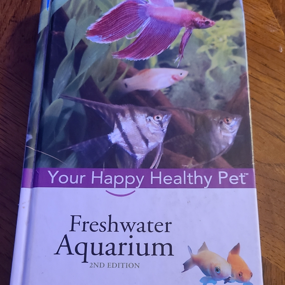 FRESHWATER AQUARIUM  your happy healthy pet. BOOK.